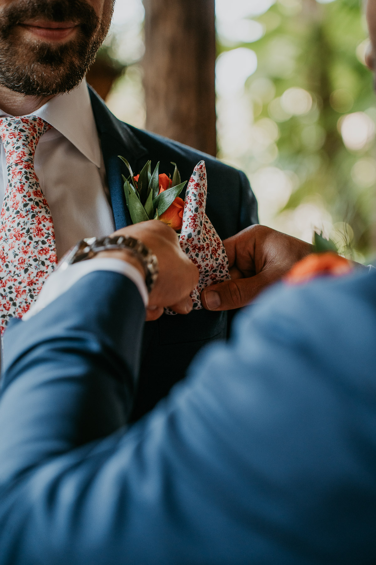 Suit detail at Hacienda Siesta Alegre LGBTQ+ Wedding