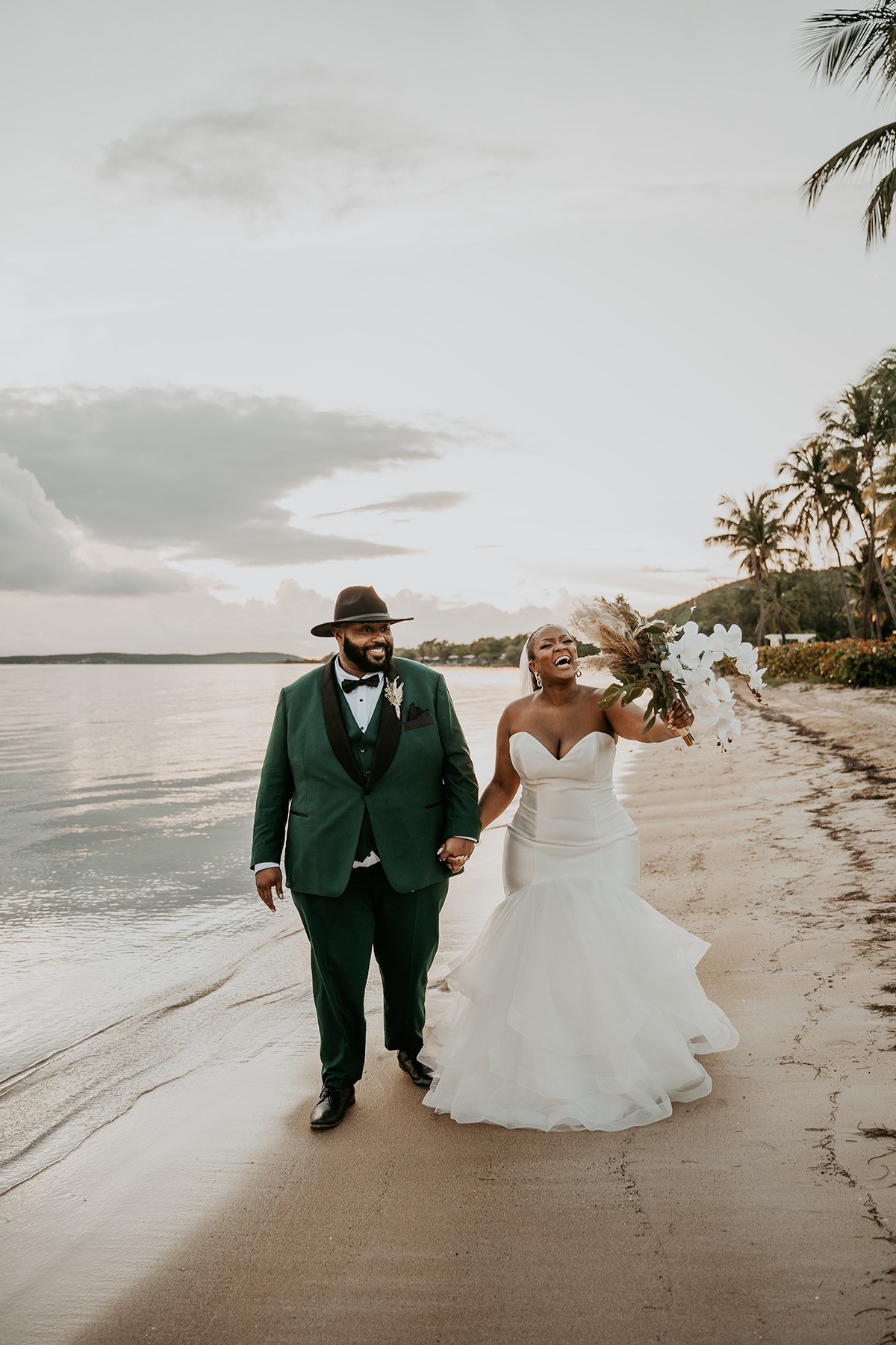 Copa Marina beach wedding black couple walking along shore