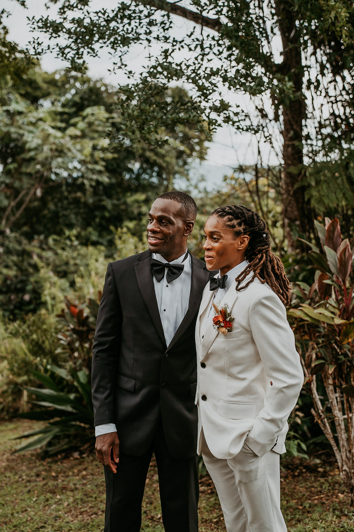 Bride smiles as she sees her bride walk towards her during an intimate micro wedding in Puerto Rico.