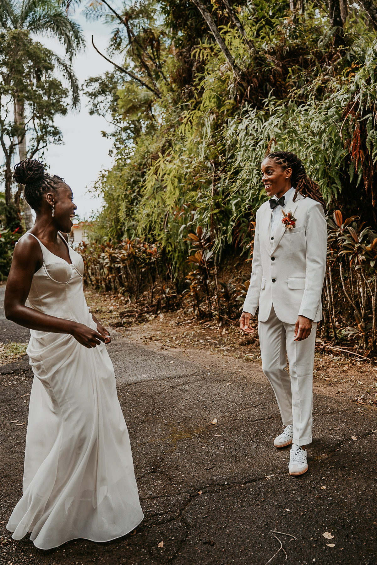 Emotional first look between two African American brides before their micro wedding in Puerto Rico.