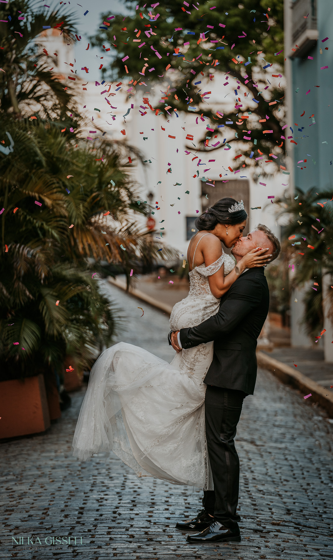 Bride and groom celebrating at Old San Juan wedding