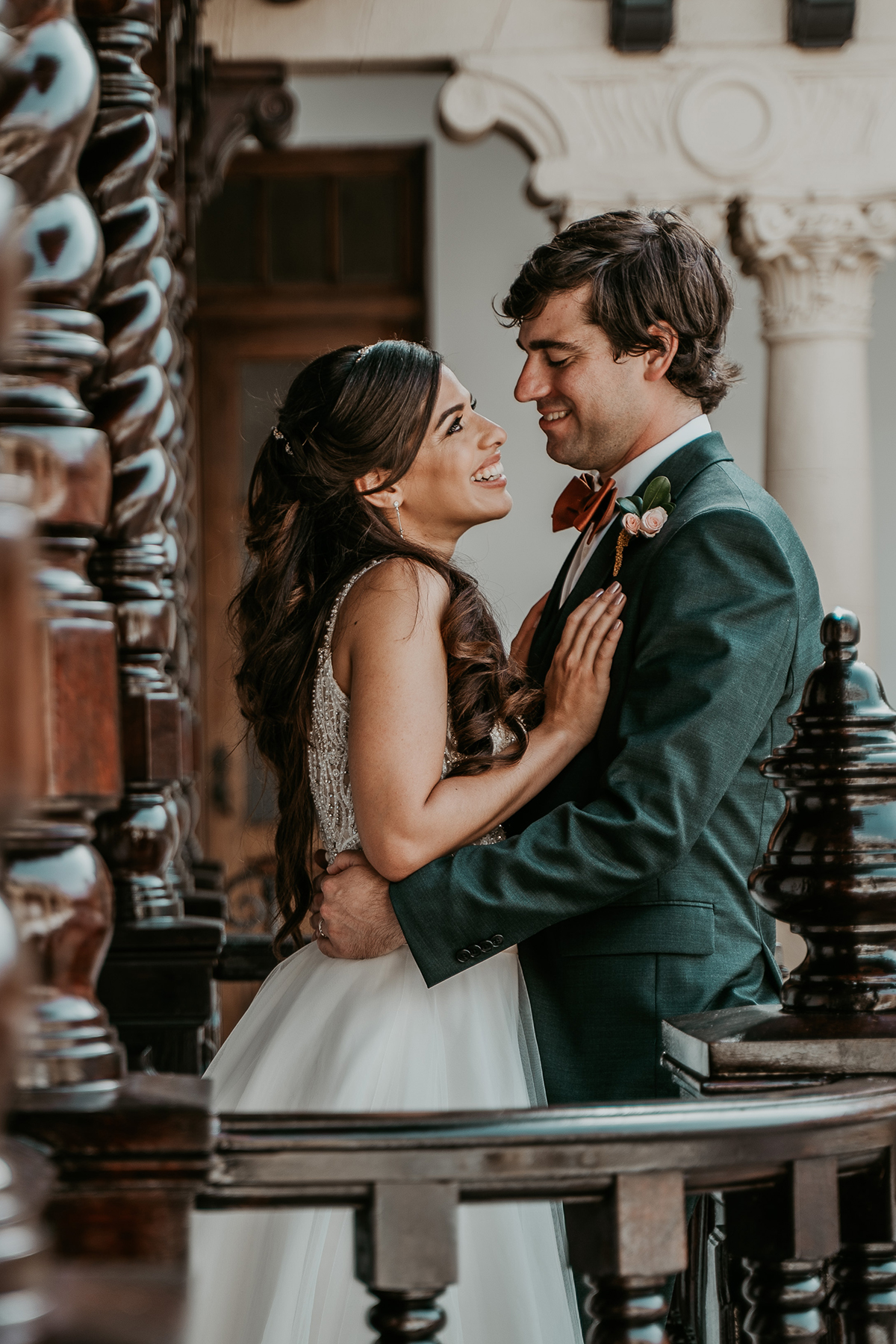 Bride and groom smiling at each other during their Old San Juan wedding