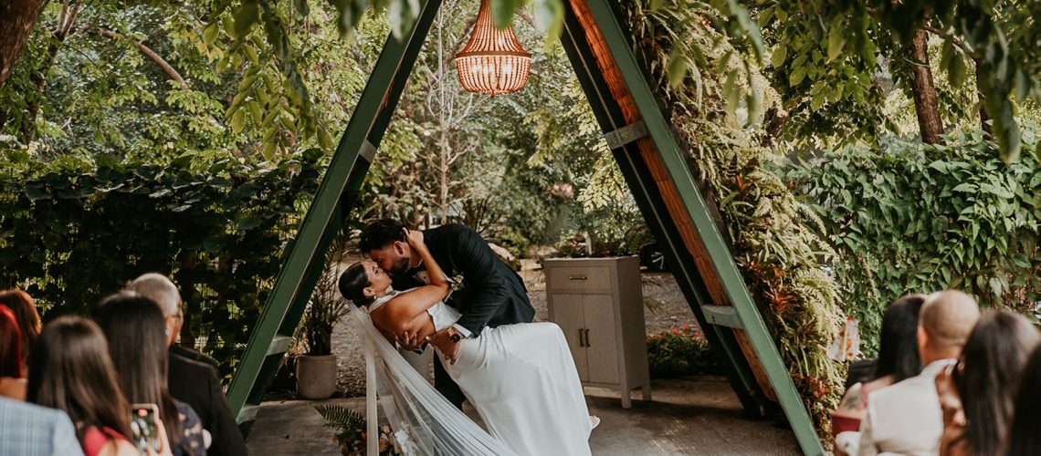 First kiss couple during wedding ceremony at Aldeana mountain venue