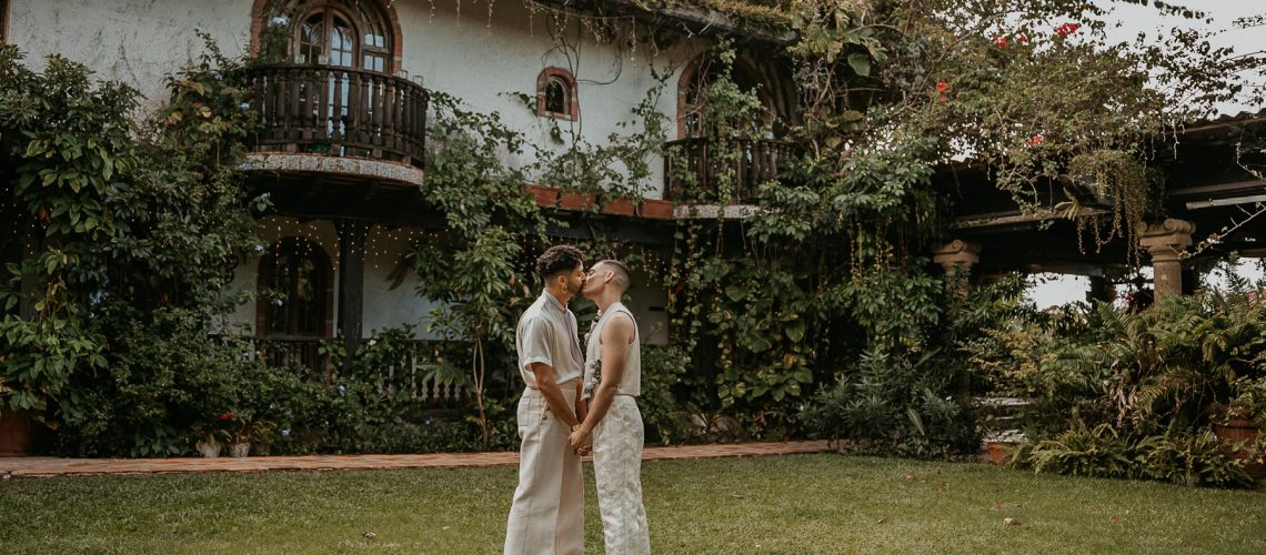 LGBTQ couple portraits in Puerto Rico with natural light, candid connection, and tropical scenery.